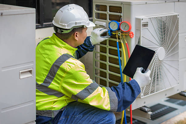 Professional Hvac technician working in Youngsville, LA